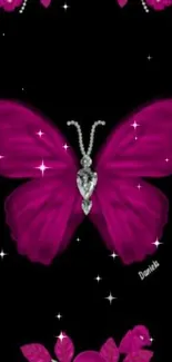 Ornate magenta butterfly with floral design on black background.