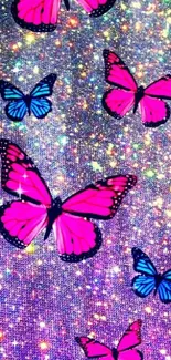 Pink and blue butterflies on a sparkling background