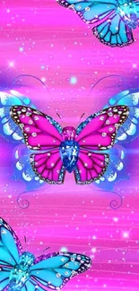 Vibrant pink and blue butterfly wallpaper with sparkling details.