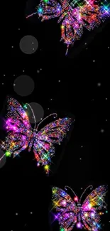 Vibrant butterfly wallpaper with neon colors on a black background.