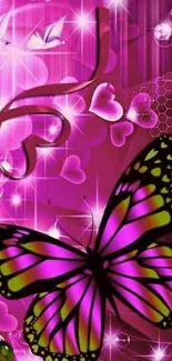 Vibrant pink butterfly with sparkles on wallpaper.