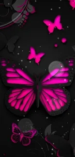 Vibrant pink butterflies on black background wallpaper.