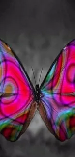 Vibrant neon butterfly mobile wallpaper with psychedelic patterns.