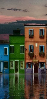 Evening canal with colorful houses reflecting on still water, vibrant and calming.