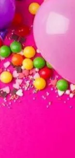 Vibrant candy-themed wallpaper with pink and purple balloons, sweets, and candies.