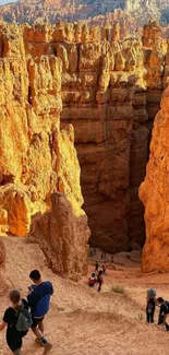 Vibrant orange canyon with hikers exploring the landscape.