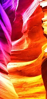 Colorful canyon wallpaper with vibrant orange and purple hues.