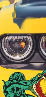 Yellow sports car with a vivid snake illustration on the front.