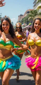 Cheerful carnival dancers in vibrant costumes.