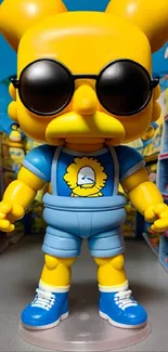 Bright vinyl figure with sunglasses in a colorful display setting.