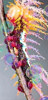 Vibrantly colored exotic caterpillar on branch.