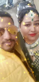 Vibrant couple celebrating with golden sparkles.