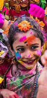 Colorful festival celebration wallpaper with smiling child and vibrant hues.