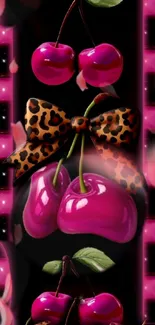 Glossy cherries with leopard print ribbon on vibrant wallpaper.