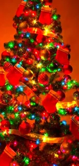 Vibrant Christmas tree with colorful lights and stockings.