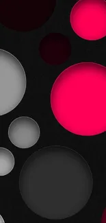 Neon pink and grayscale circles on a black background mobile wallpaper.