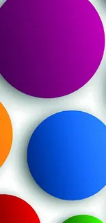 Colorful circle pattern wallpaper with vibrant gradients.