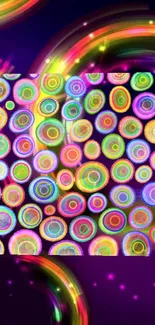 Vibrant abstract wallpaper with colorful circles on a dark background.