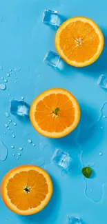 Orange slices and ice on a vibrant blue background wallpaper.