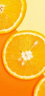 Bright orange slices create a vibrant, fruity wallpaper design.