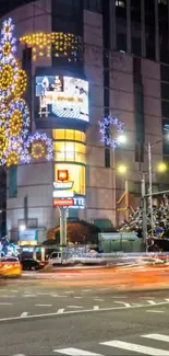 Nighttime city street with festive holiday lights and vibrant urban energy.