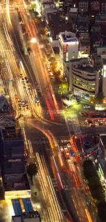 Vibrant city nightscape with light trails.