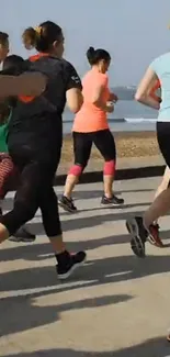 Group of runners in a city marathon by the water.