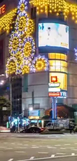 Bright city building with festive neon lights and vibrant yellow decorations.