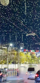 City at night with festive lights across a busy street.