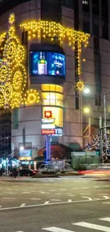 Vibrant city night scene with festive lights and busy streets.