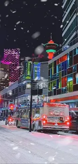 Snowy city street with vibrant lights and colorful buildings at night.