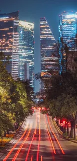 Vibrant city nightscape with skyscrapers and light trails.