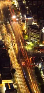 Aerial view of vibrant city lights at night, showcasing dynamic urban energy.