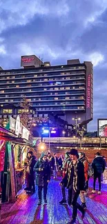 Vibrant night cityscape with illuminated skyline and lively market scene.