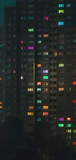 Nightscape with colorful windows and full moon.