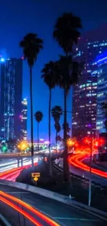 Vibrant night cityscape with neon lights and skyscrapers.