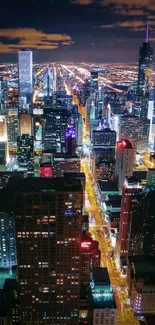 Vibrant city skyline with illuminated skyscrapers at night.