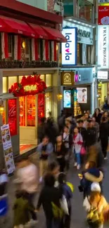 Bustling city street scene with vibrant lights and crowds.