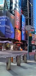 Vibrant city street with skyscrapers and colorful billboards on a sunny day.