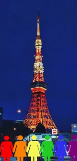 Colorful silhouettes in front of illuminated city tower at night, vibrant skyline.