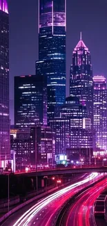 Purple cityscape at night with glowing skyscrapers and vibrant lights.