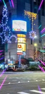 Vibrant cityscape with neon lights and festive holiday decor at night.