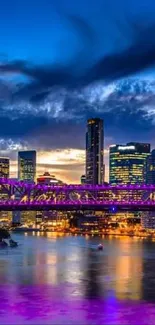 Night view of a cityscape with a brightly lit purple bridge.