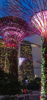 Singapore's cityscape with illuminated trees at night in vibrant colors.