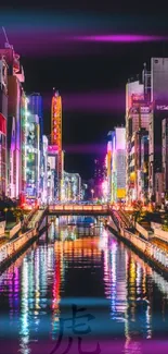 Vibrant cityscape with neon lights reflecting on a canal at night.