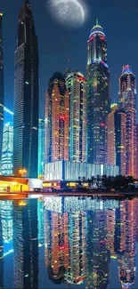 Illuminated skyscrapers reflecting on water under a moonlit sky.