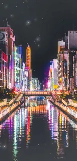 Vibrant cityscape with colorful buildings reflected in a river at night.