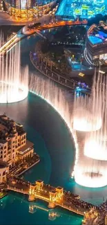 Spectacular nighttime cityscape with illuminated fountains.