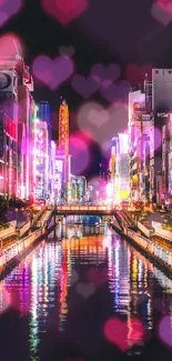 Vibrant cityscape at night with neon reflections on a tranquil river.