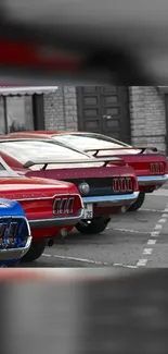 Classic red and blue cars parked in a row.